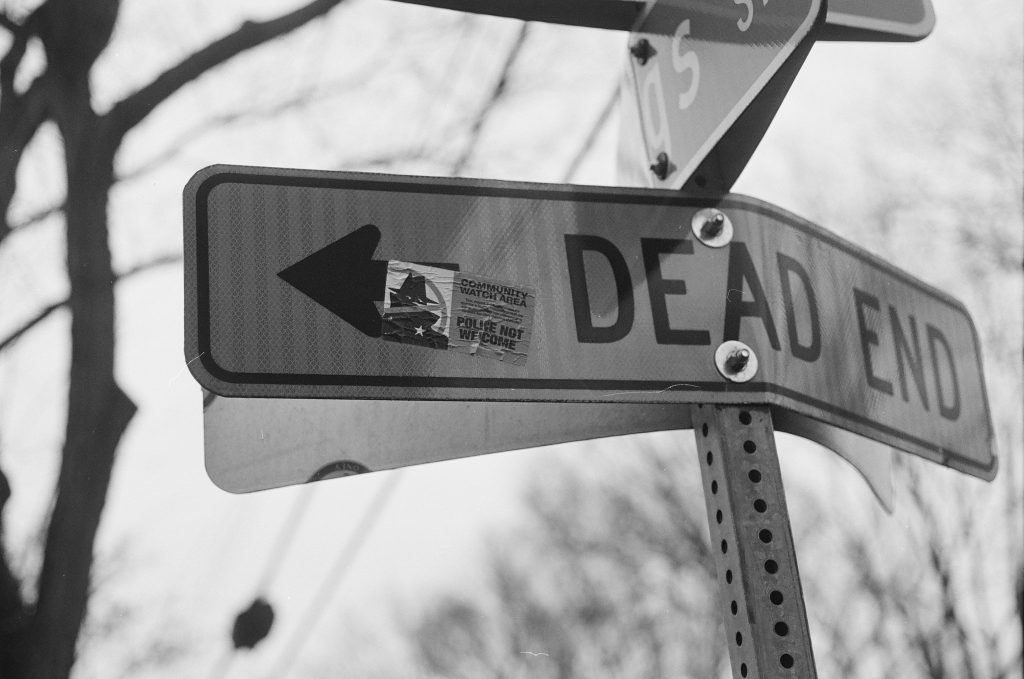 "Police Not Welcome" Rochester, NY. Shot with a Canon AE-1P. 50mm f1.8 using Ilford XP2 film.