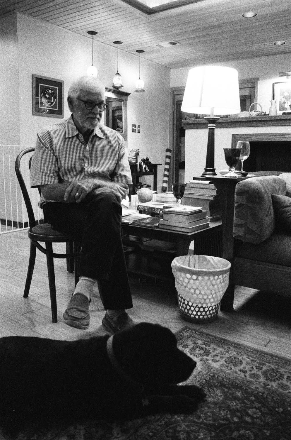 A shot of a relative and his dog. Shot at 3200, and developed at 3200 by the Darkroom.
