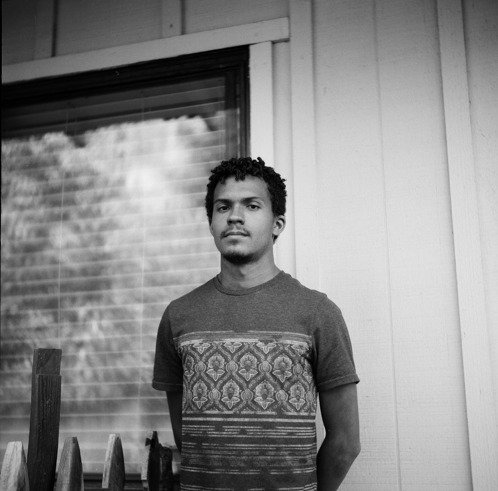 Raji on the porch. Shot on 120 format on a Yashica A.