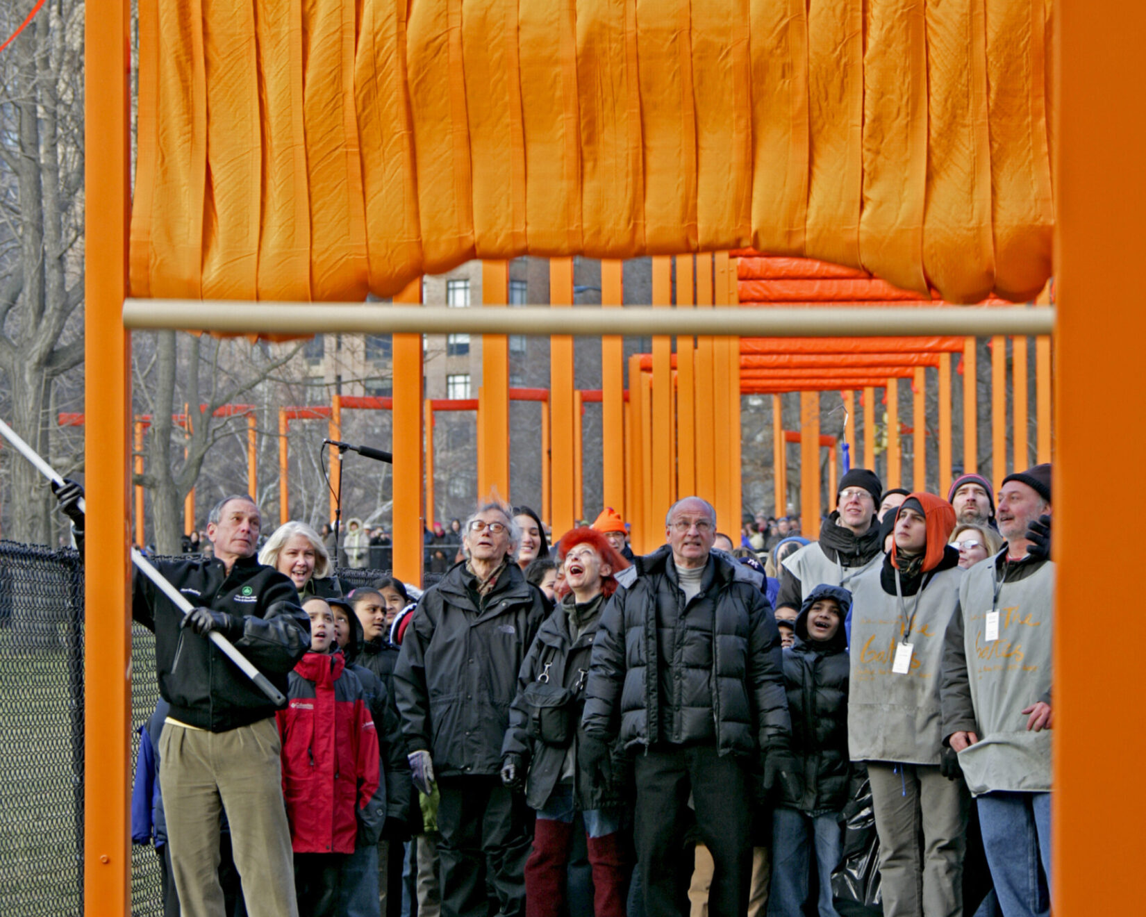 Artists with Mayor Bloomberg unfurling the first panel