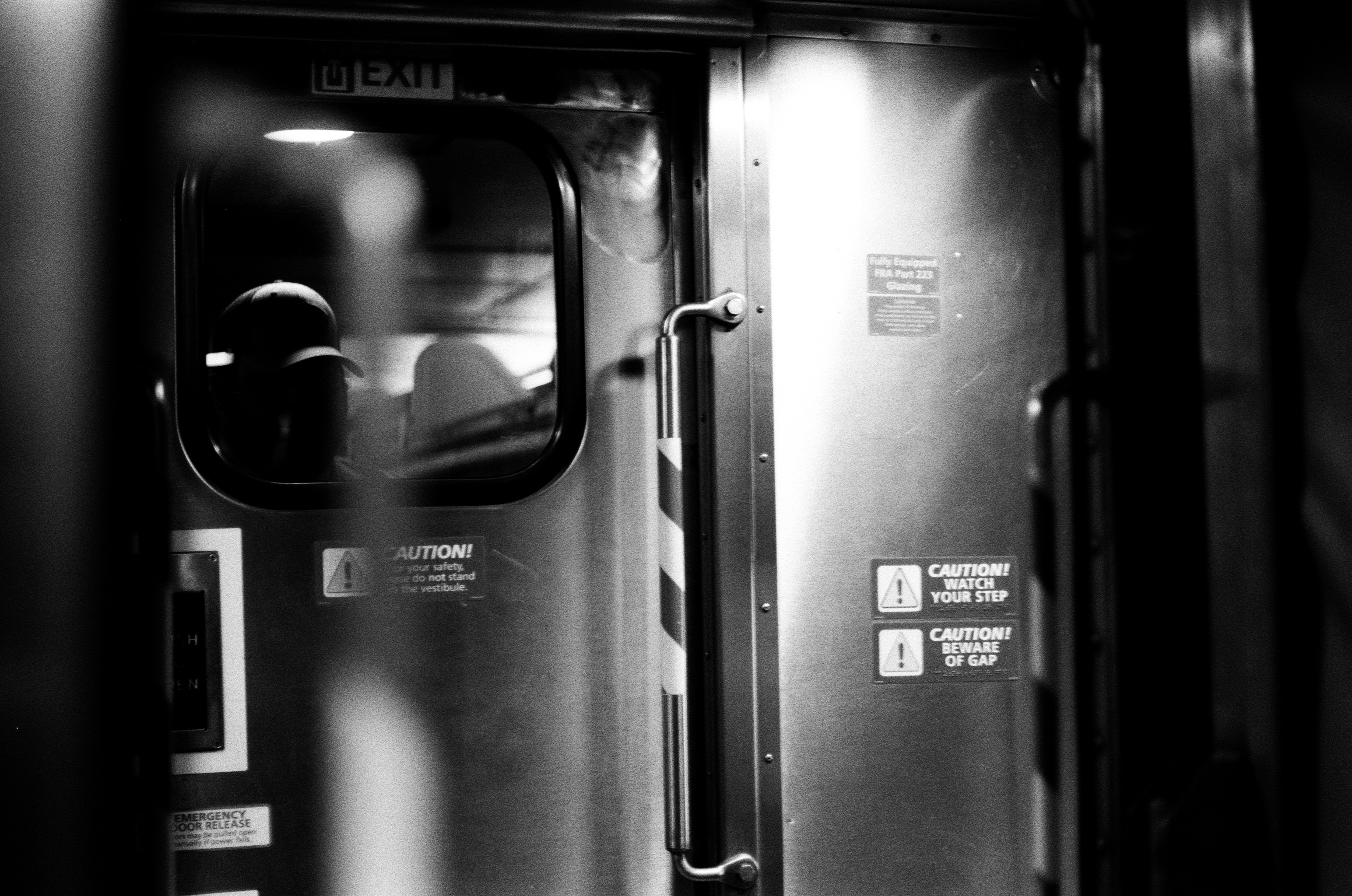 Shot with Nikon F2S Nikkor H.C 50mm f/2 on a train, +1 stop